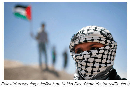 Palestinian wearing a keffiyeh on Nakba Day (Photo:Ynetnews/Reuters)