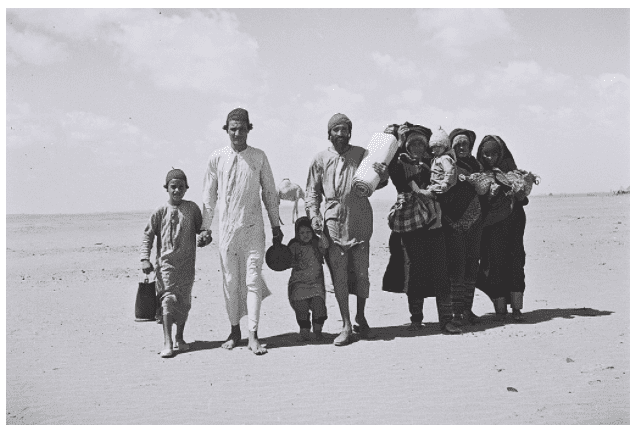 A Yemenite Jewish family walking through the desert to a reception camp near Aden in 1949 (Zoltan Kluger - National Photo Collection of Israel)
