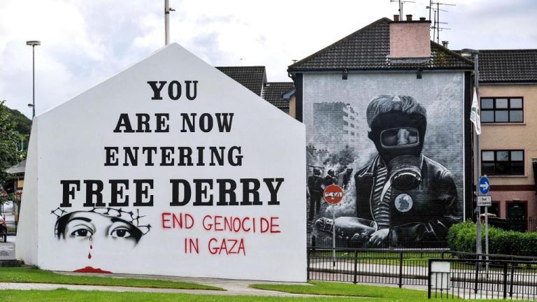 Anti-Israel graffiti on the Free Derry mural in Derry city